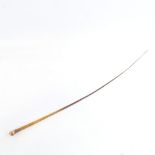 A rhino horn riding crop with 9ct gold planished top, inscribed EC Olympia 1920, by Swaine & Adeney,