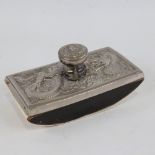 A Chinese nickel-plate desk blotter, circa 1900, with relief dragon design, length 13.5cm Plating is