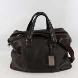 DOLCE & GABBANA - a dark brown leather holdall with shoulder strap, length approx 48cm New and