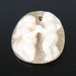 A Roman cameo carved hardstone pendant, in natural 2-colour stone, depicting 2 Classical figures,