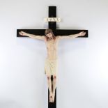A 19th century carved and painted wood crucifix, overall height 108cm Good original condition, the