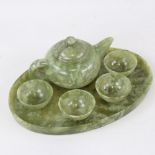 A Chinese green stone tea set on matching tray, tray length 17cm Good condition
