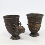A pair of 19th century Indian or Middle Eastern unmarked silver ceremonial cups of cornucopia form