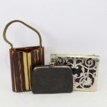 An Art Deco brass and enamel combination compact/purse, a German leather and silver plate evening