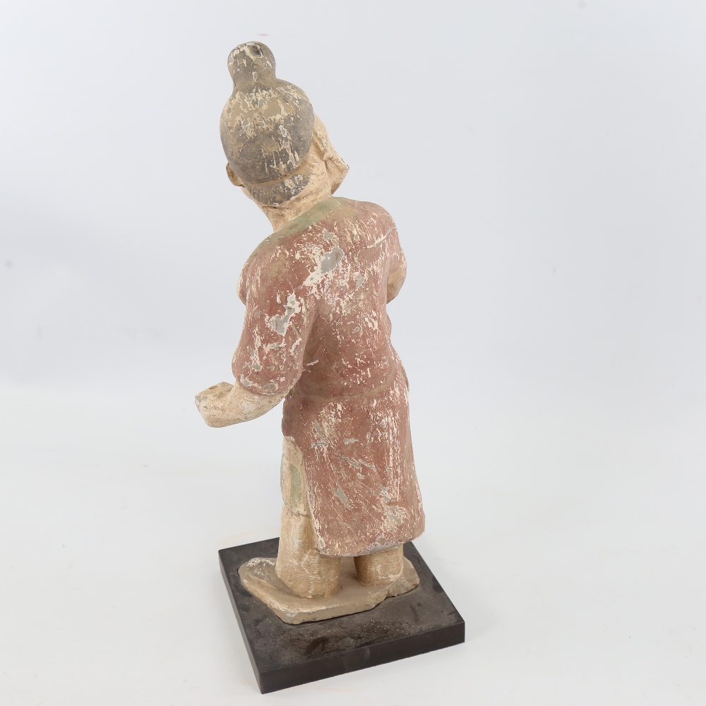 An Indian/Chinese painted terracotta standing figure wearing a turban, on wood plinth, height 41cm - Image 4 of 4