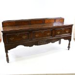 An 18th century oak 3-drawer dresser base, with 5-drawer fitted upper part and single drawer to