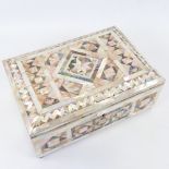 A mother-of-pearl and abalone parquetry box, inscribed Bethlehem, on brass ball feet, 25cm x 17cm