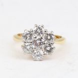 A late 20th century 18ct gold 7-stone diamond cluster flowerhead ring, set with modern round