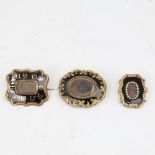 3 Victorian black enamel mourning brooches, unmarked yellow metal settings with central hair panels,