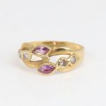 An Italian 18ct gold pink sapphire and CZ dress ring set with marquise sapphires, setting height 9.