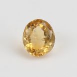 A 2.78ct unmounted oval mixed-cut Madeira yellow citrine, dimensions: 9.51m x 8.26mm x 6.04mm, 0.