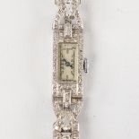 A lady's Art Deco platinum and diamond mechanical cocktail wristwatch, rectangular case with