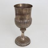 A George III Irish silver trophy cup, half fluted thistle form with gadrooned foot and