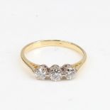 An 18ct gold 3-stone diamond ring set with modern round brilliant-cut diamonds, total diamond