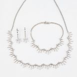 A Turkish 14ct white gold diamond drop demi-parure, comprising necklace, bracelet and pair of