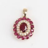 A modern 14ct gold ruby and diamond cluster pendant, set with oval mixed and round-cut rubies with
