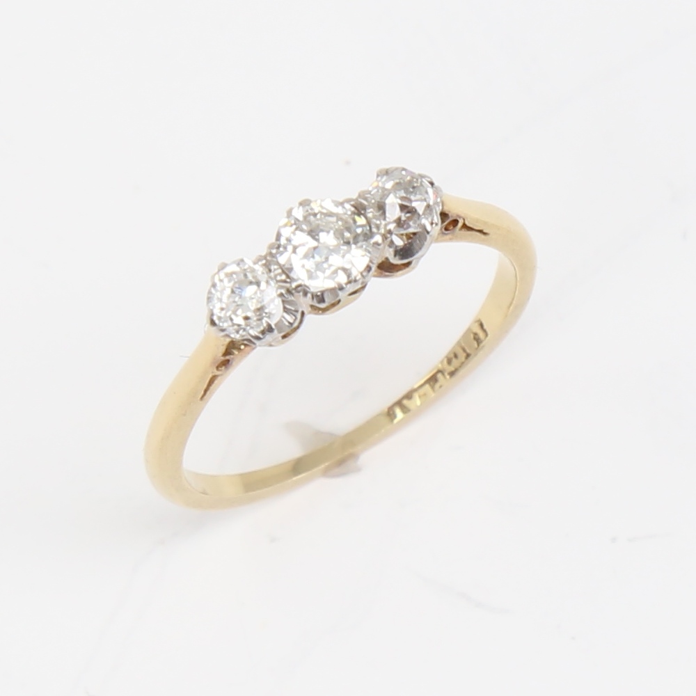 An early 20th century 18ct gold 3-stone diamond ring, set with round brilliant and old-cut diamonds, - Image 3 of 5