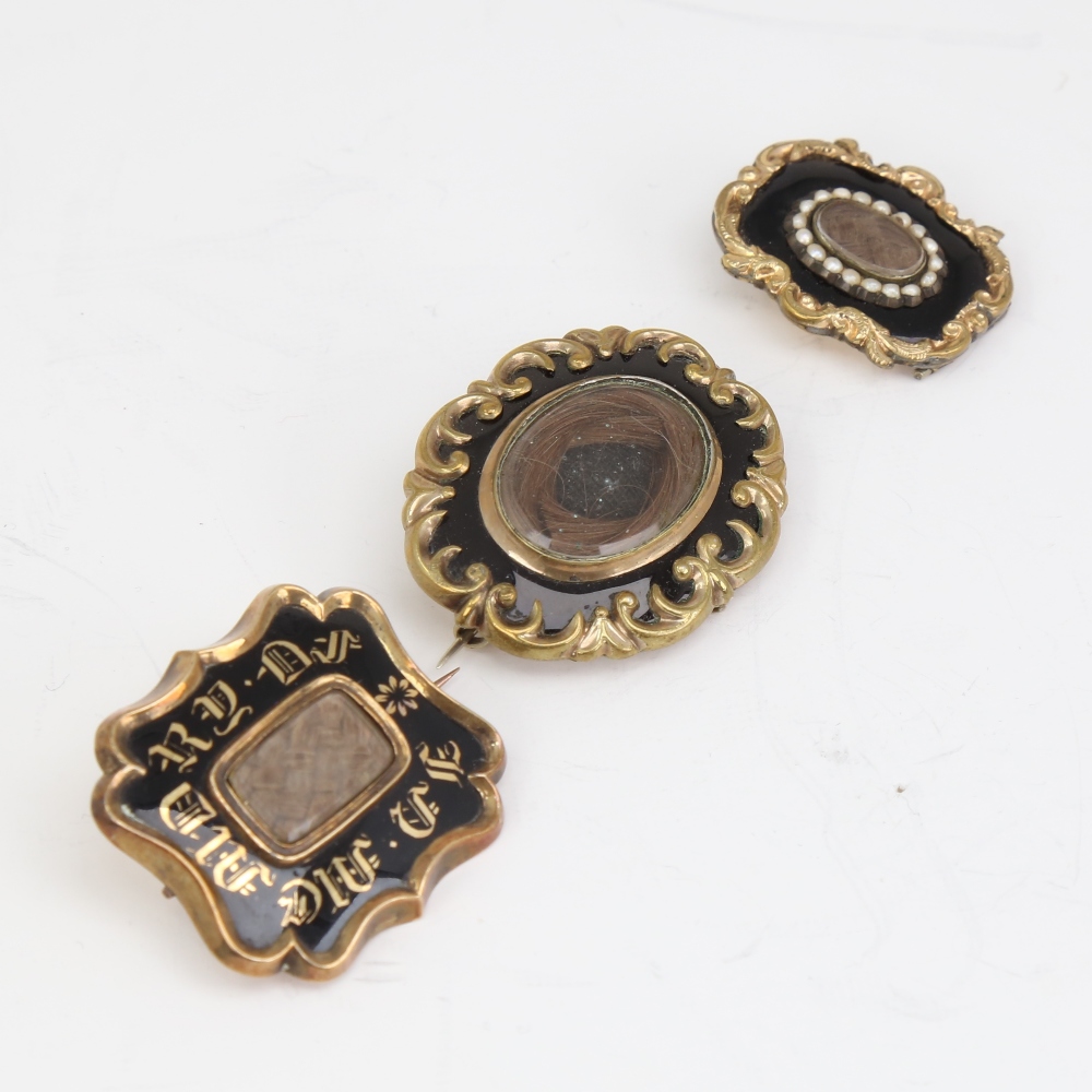 3 Victorian black enamel mourning brooches, unmarked yellow metal settings with central hair panels, - Image 2 of 5