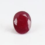 A 1.99ct unmounted oval mixed-cut African ruby, dimensions: 9.03mm x 6.90mm x 3.32mm, no