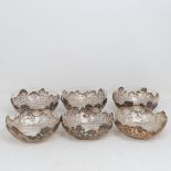 A set of 6 Chinese export silver and clear glass bowls, by Wang Hing, circular form with relief
