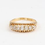 An Antique 18ct gold 7-stone diamond half hoop ring, set with old-cut diamonds, total diamond