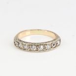 A 9ct gold 8-stone diamond half eternity ring, set with old-cut diamonds, total diamond content