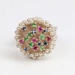 A modern handmade sterling silver gem set ring, organic form, set with sapphire ruby and diopside,