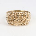 A late 20th century 9ct gold shot keeper's ring, hallmarks London 1977, setting height 12.1mm,