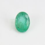 A 2.57ct unmounted oval mixed-cut emerald, dimensions: 10.32mm x 7.49mm x 5.14mm, evidence of