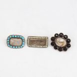 3 Antique mourning brooches, all stone set with hair panel centres, unmarked yellow metal
