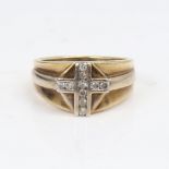 A large modern 9ct gold diamond cross signet ring, total diamond content approx 0.2ct, setting
