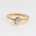 An 18ct gold 0.15ct solitaire diamond ring, high wrap-around setting with modern round brilliant-cut