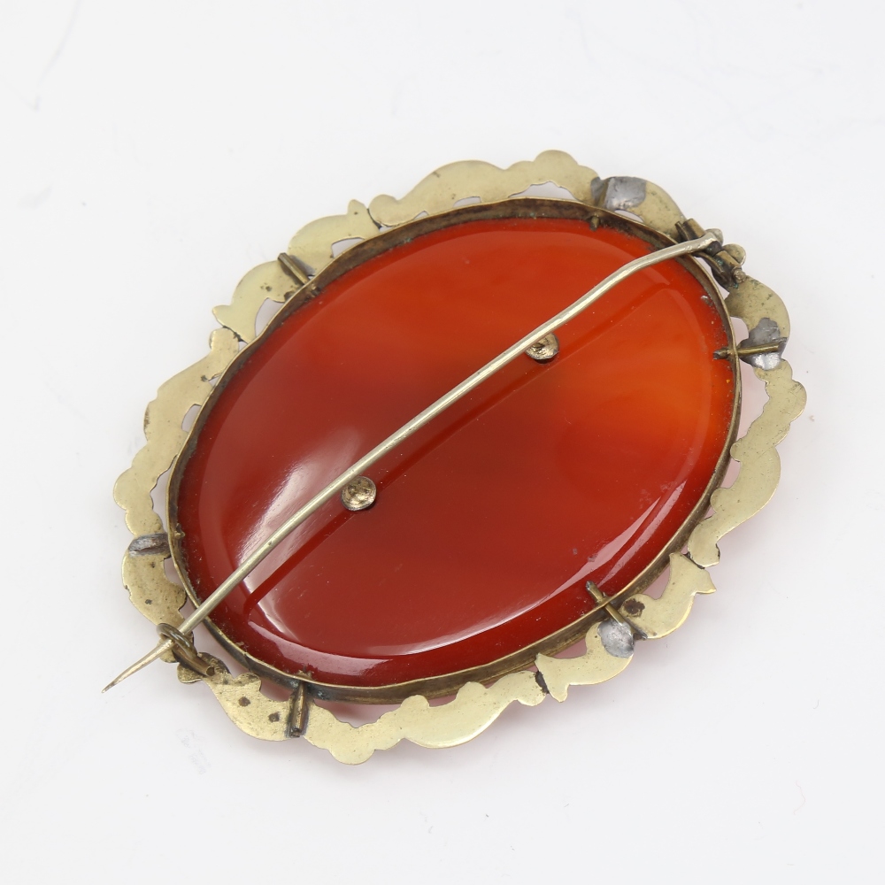 A large Victorian oval mourning brooch, unmarked yellow metal settings with red banded agate and - Image 2 of 5