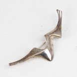 A Vintage stylised sterling silver abstract brooch, by George Tarratt for Des Ernest Blyth, model