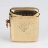 An early 20th century 9ct gold Vesta case, engine turned decoration with cartouche, by Horace