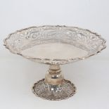 A late Victorian silver pedestal tazza, circular form with scalloped and pierced rim, by