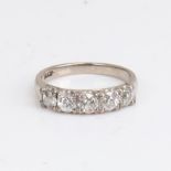 A 14ct white gold 5-stone diamond half hoop ring, set with old European-cut diamond, total diamond