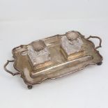 An Edwardian silver 2-handled deskstand, rectangular form with scalloped rim, 2 pen trays and