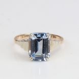 A Vintage 9ct gold aquamarine dress ring set with emerald-cut aqua and stepped unmarked 18ct white