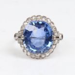 A large French 18ct white gold sapphire and diamond cluster ring, probably Art Deco period, set with