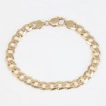 A late 20th century 9ct gold flat curb link bracelet, bracelet length 22cm, 18.9g No damage or