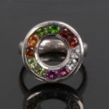 A modern handmade unmarked silver gem set halo ring, setting height 19.2mm, size P, 6.7g No damage