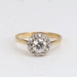 An 18ct gold diamond cluster halo ring, set with old European and single-cut diamonds, central