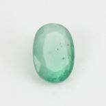 A 3.54ct unmounted oval mixed-cut emerald, dimensions: 12.90mm x 8.98mm x 3.97mm, 0.71g, with IDT