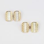 A pair of 9ct gold cufflinks, canted rectangular form with engine turned decoration, panel length
