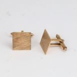 A pair of Chinese 9ct gold cufflinks, engine turned brush decoration, panel width 16.1mm, 9.3g No