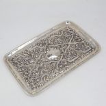 An Edwardian rectangular silver tray, allover relief embossed foliate decoration, by Williams