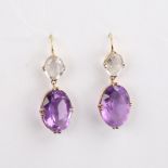 A pair of Antique unmarked gold amethyst and quartz drop earrings, set with oval mixed-cut stones,