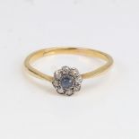An 18ct gold sapphire and diamond cluster flowerhead ring, set with round-cut sapphire and single-