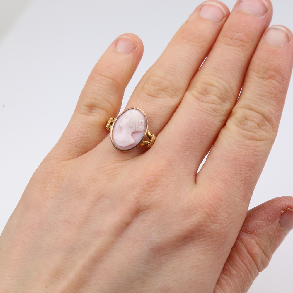 An unmarked gold relief carved pink coral cameo ring, depicting female profile, setting height 16mm, - Image 5 of 5